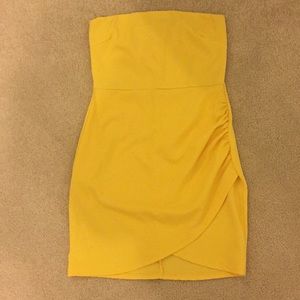 yellow strapless fitted dress